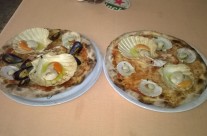 Pizza con pesce fresco